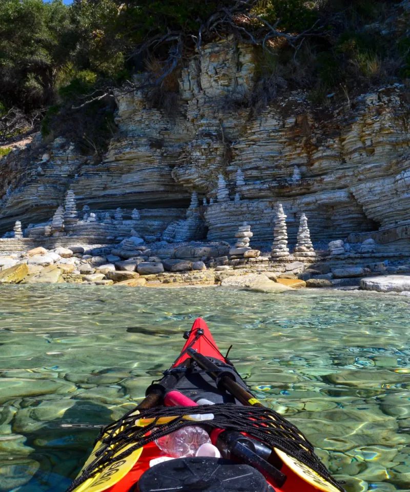 Spectacular sea kayaking experience along the coastline near Sivota in the Ionian Sea, Greece